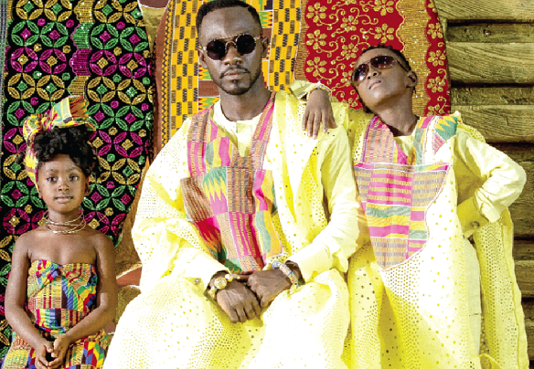 Okyeame Kwame with children Okyeame Kwame with children